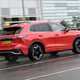 VW Tiguan review - rear, Persimmon Red, driving, Bauer Media exclusive image