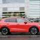 VW Tiguan review - side, Persimmon Red, driving, Bauer Media exclusive image