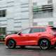 VW Tiguan review - rear side, Persimmon Red, driving, Bauer Media exclusive image