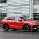 VW Tiguan review - front side, Persimmon Red, driving, Bauer Media exclusive image