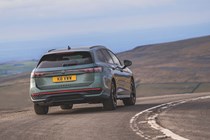 Volkswagen Passat review: rear three quarter cornering, petrol green paint