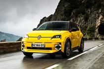 Renault 5 E-Tech (2024) review: front three quarter driving, yellow paint