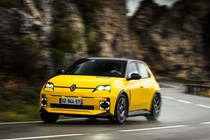 Renault 5 E-Tech (2024) review: front three quarter cornering, low angle, yellow paint