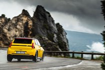 Renault 5 E-Tech (2024) review: rear three quarter cornering, wide angle, yellow paint