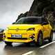 Renault 5 E-Tech (2024) review: front three quarter driving, yellow paint