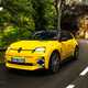 Renault 5 E-Tech (2024) review: front three quarter driving, low angle, yellow paint