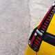 Renault 5 E-Tech (2024) review: rear light detail shot, yellow paint