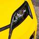 Renault 5 E-Tech (2024) review: headlight detail shot, yellow paint