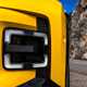 Renault 5 E-Tech (2024) review: fog light detail shot, yellow paint