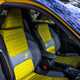 Renault 5 E-Tech (2024) review: front seats, yellow and black fabric upholstery