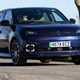 Renault 5 E-Tech review, driving, blue, front three quarters | Parkers