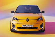 Renault 5 E-Tech Electric (2025): front static, yellow paint, studio shoot