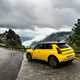 Renault 5 E-Tech (2024) review: rear three quarter static, wide angle, yellow paint