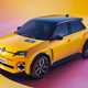 Renault 5 E-Tech Electric (2025): front three quarter static, high angle, yellow paint, studio shoot