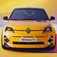 Renault 5 E-Tech Electric (2025): front static, yellow paint, studio shoot