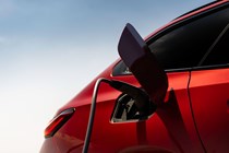 BMW i5 Touring: M60 model, charging port, red paint