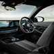 BMW i5 Touring: dashboard and infotainment system, black leather upholstery