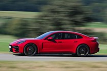 Porsche Panamera GTS: side view driving, red paint