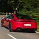 Porsche Panamera GTS: rear three quarter driving, red paint