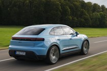 Porsche Macan Electric (2024) review: rear three quarter driving, blue paint