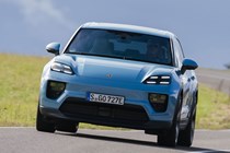 Porsche Macan Electric (2024) review: front cornering, blue paint, low angle