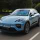 Porsche Macan Electric (2024) review: front three quarter driving, high angle, blue paint