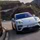 Porsche Macan (2024) review: front cornering, mountain road, silver paint
