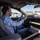 Porsche Macan (2024) review: Piers Ward driving, interior detail shot, light tan upholstery