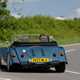 Morgan Plus Six review - rear, blue, driving round corner, exclusive Bauer image