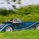 Morgan Plus Six review - rear side, blue, driving in countryside, exclusive Bauer image