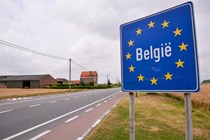 Belgium border sign at road side - driving in Belgium