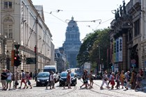 Pedestrians crossing road in Brussels - driving in Belgium