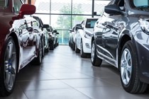 Cars lined up in showroom - What is depreciation