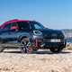 MINI Countryman JCW (2024) review: front three quarter static, black and red paint