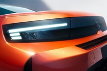 Vauxhall Frontera (2024): LED headlight detail shot, orange paint