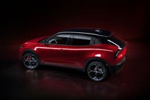 Alfa Romeo Milano: rear side view static, studio shoot, red paint