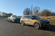 The Parkers Skoda Kodiaq long-term test car towing a racing car