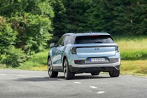 Ford Explorer review: rear three quarter cornering, blue paint, country road