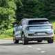 Ford Explorer review: rear three quarter cornering, blue paint, country road