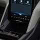 Ford Explorer review: infotainment screen, in highest position, revealing storage storage tray