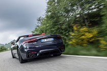Maserati GranCabrio Trofeo review: rear three quarter driving, low angle, black paint