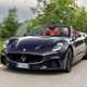 Maserati GranCabrio Trofeo review: front three quarter driving, close up shot, black paint