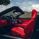 Maserati GranCabrio Trofeo review: front seats and dashboard, red leather upholstery