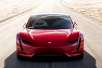 Tesla Roadster Driving