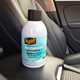 Meguiar's air con refresher on car armrest