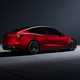 Tesla Model 3 Performance: rear three quarter static, high angle, red paint, studio shoot