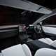 Tesla Model 3 Performance: interior, dashboard and infotainment system, white upholstery, studio shoot