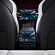Tesla Model 3 Performance: infotainment system detail, white upholstery, studio shoot