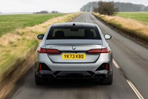 BMW 5 Series review: rear driving, low angle, matte grey paint