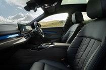 BMW 5 Series review: front seats, black leather upholstery